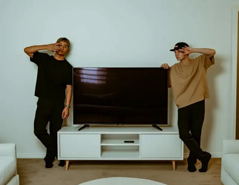Minimalist Living Room Transformation - Before & After with a Black TV Wall